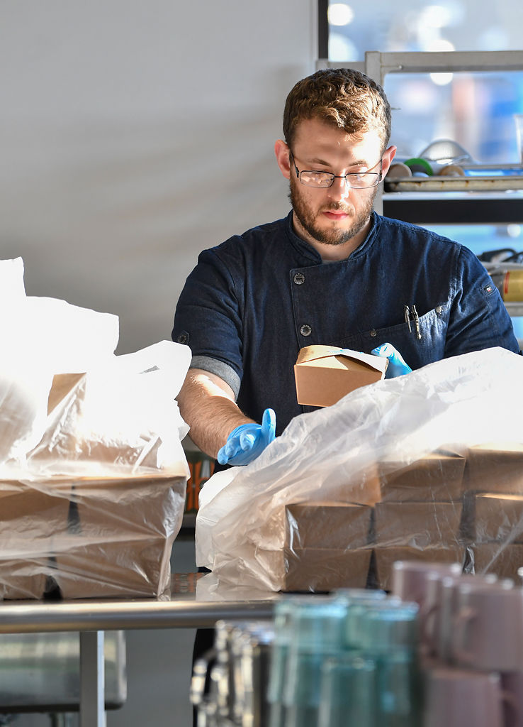 Eddie Biggar packs up food purchased by Veterans United